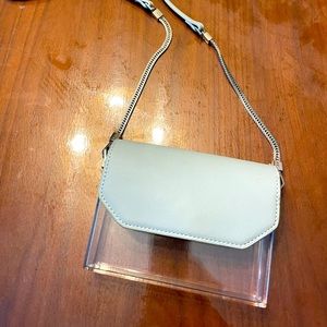 Acrylic crossover purse.
